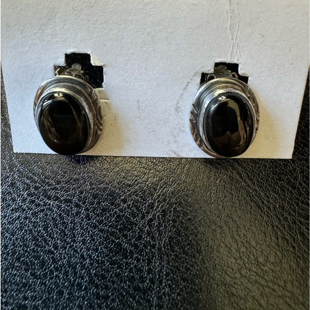 Clip Sterling silver black stone earrings.